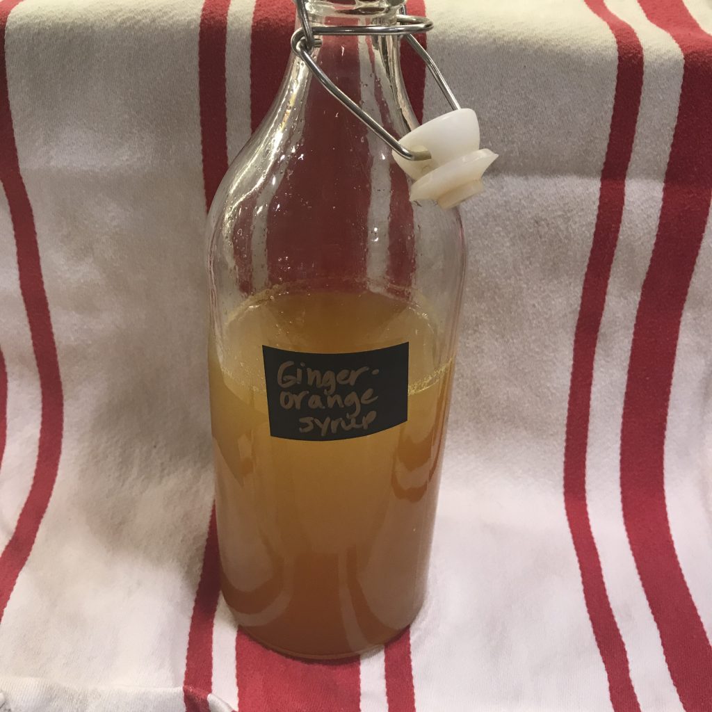 Bottle of orange ginger syrup