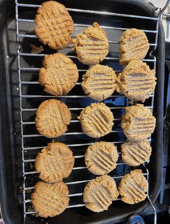 peanut butter cookies cooling on a rack