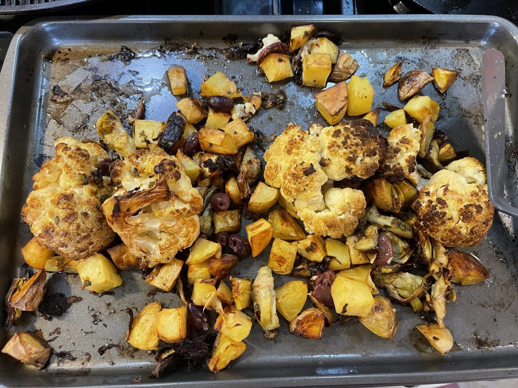 sheet pan of cauliflower, potatoes and artichoke hearts